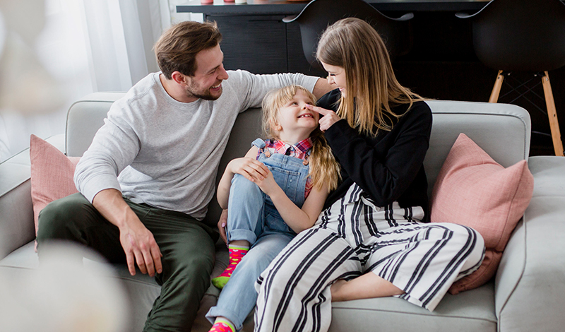 Parents with baby sleeping